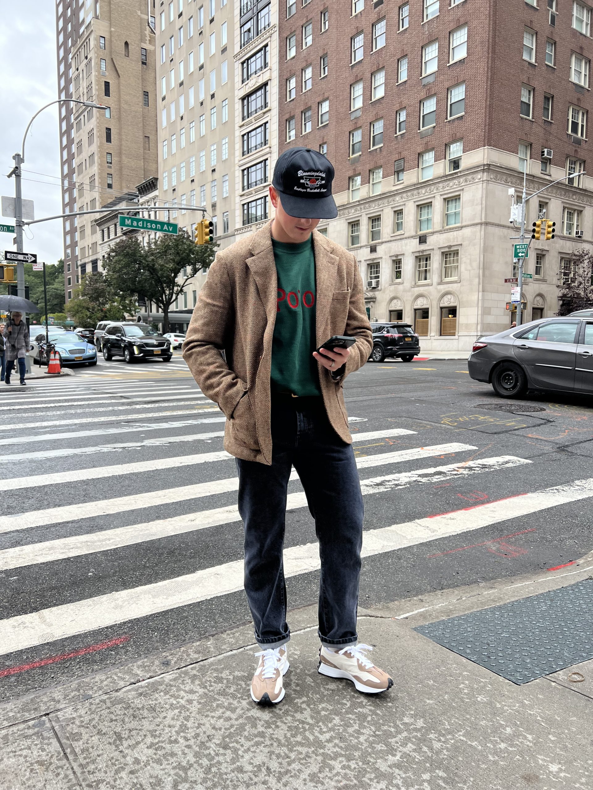Nathan standing on a street corner in New York City.