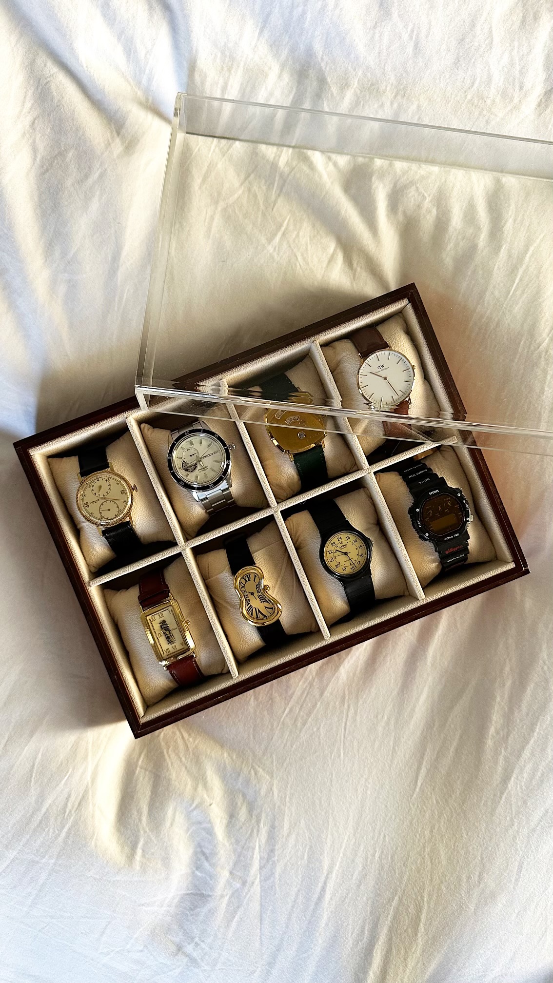 Nathan's watch collection of eight different watches.